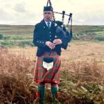 Gary MacPhie playing the Bagpipes on the Island of Colonsay